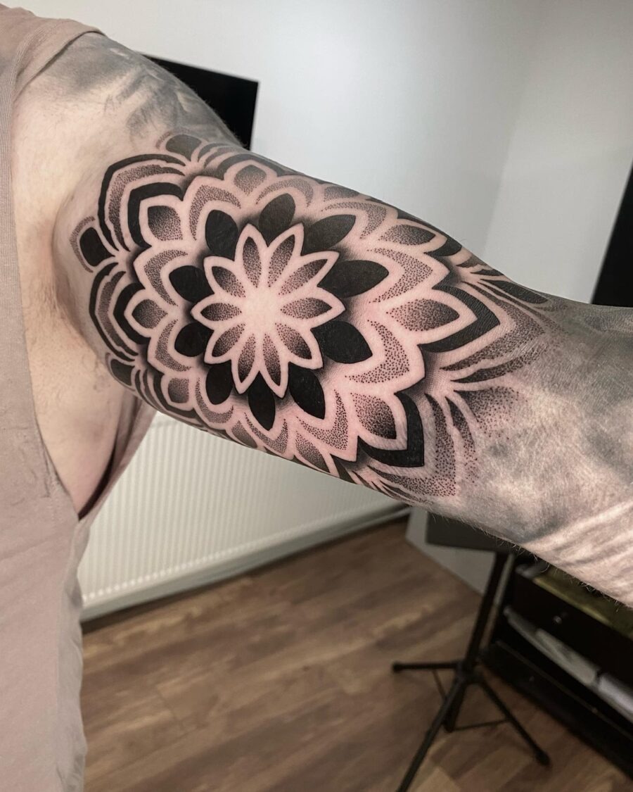 Colorful floral design in a unique vase Tattoo Design