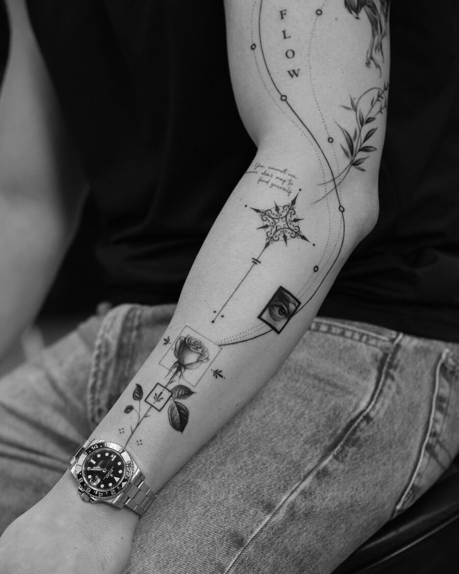 Elegant black and white biceps tattoo design Tattoo Design