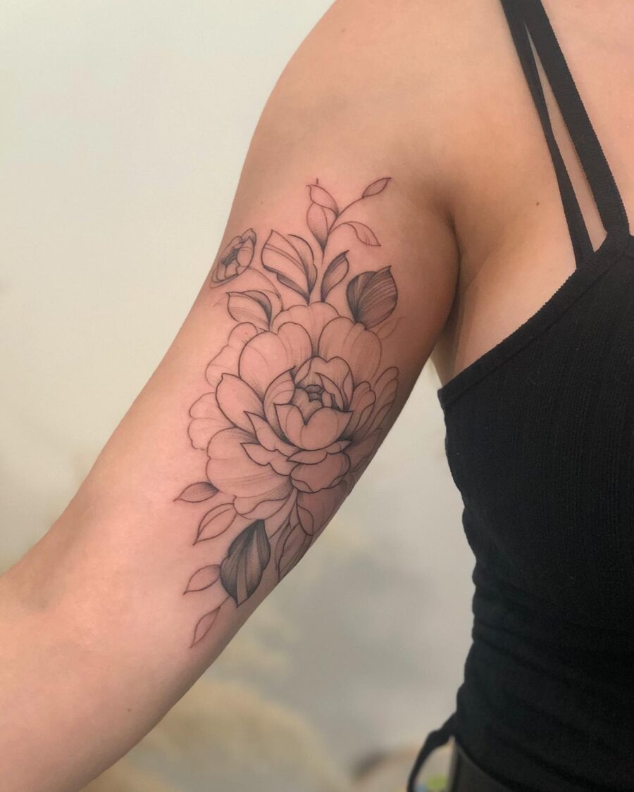 Elegant floral design accentuates the bicep Tattoo Design