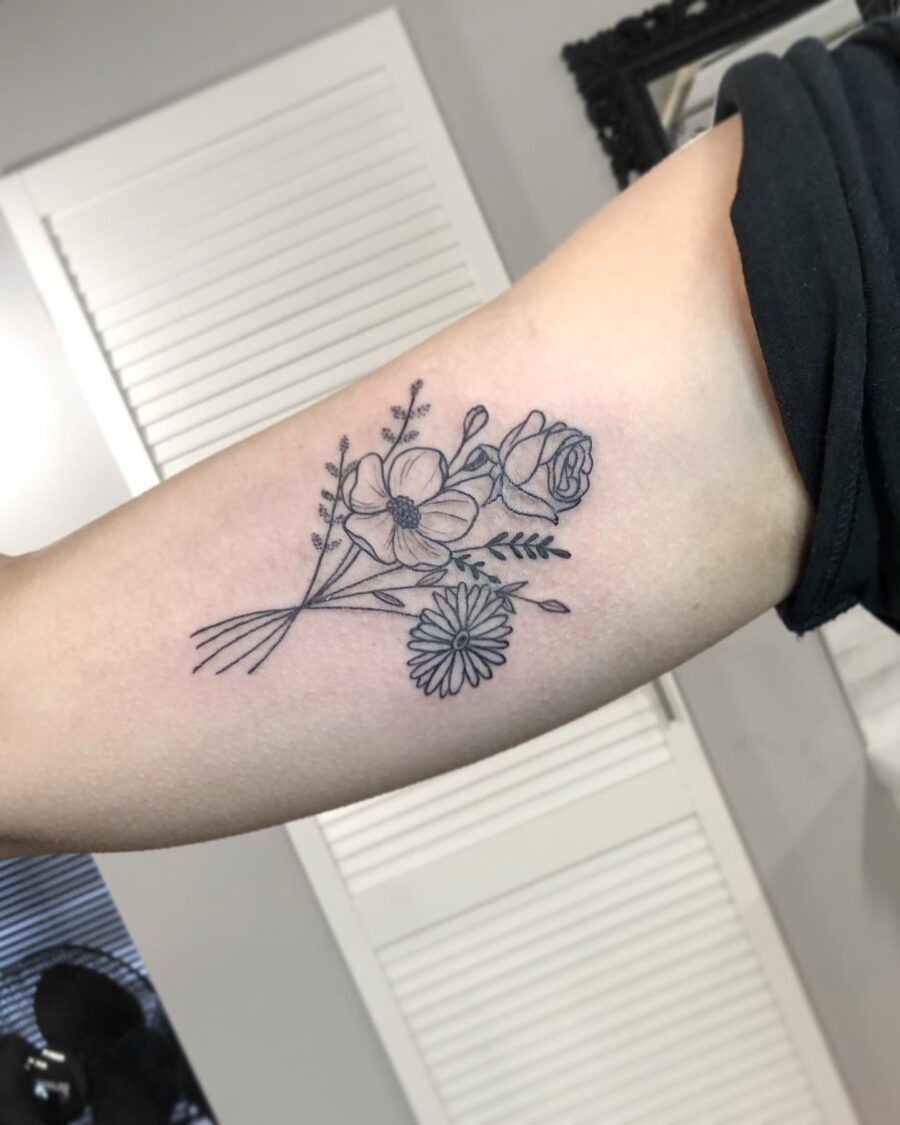 Elegant floral design for bicep tattoos Tattoo Design