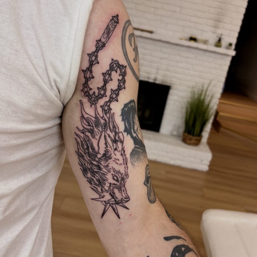 Fiery fox tattoo design on bicep. Tattoo Design