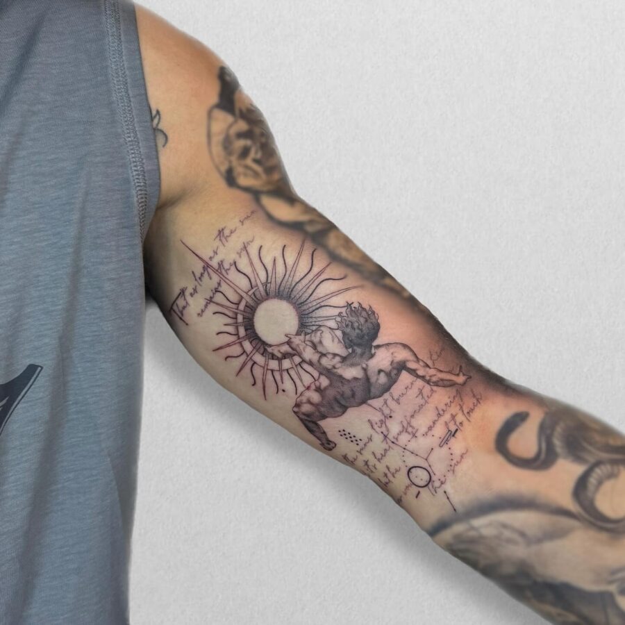 Stunning angel face tattoo on bicep Tattoo Design