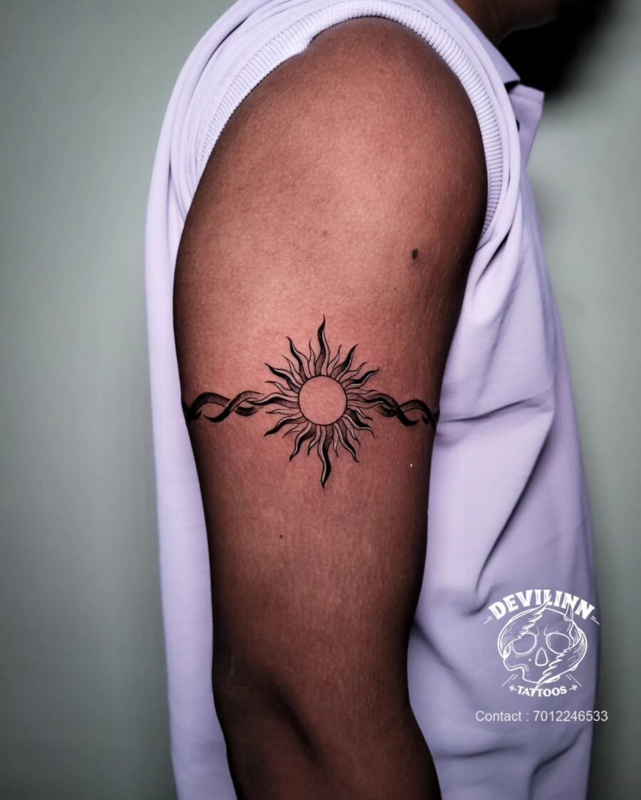 Stylish sun and infinity bicep tattoo Tattoo Design