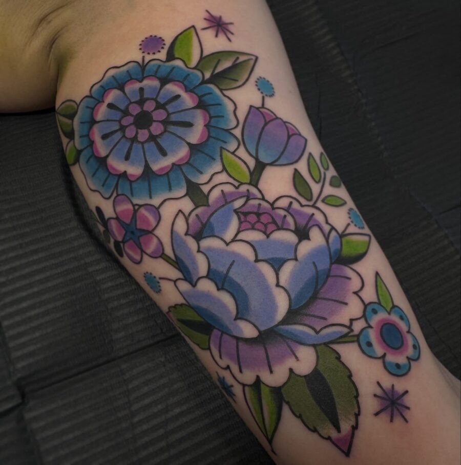 Vibrant floral biceps tattoo design for aesthetics Tattoo Design