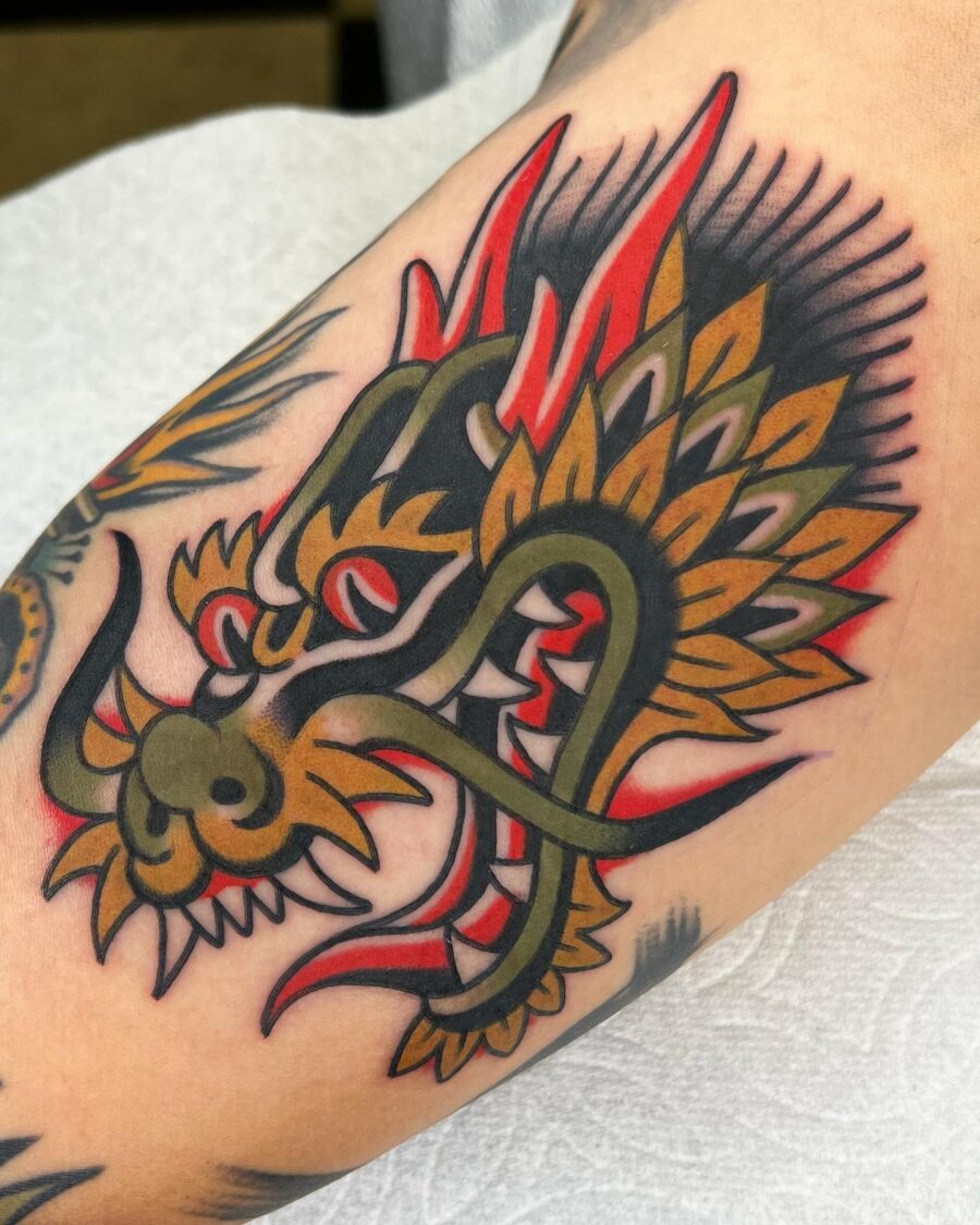 Vibrant UFO Tattoo with Floral Elements Tattoo Design