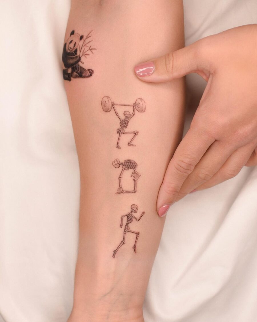 Whimsical Biceps Tattoo Art Featuring Skeletons Tattoo Design