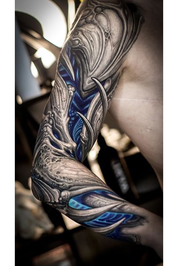 Black and White Biomechanical Tattoo with Blue Tattoo Design
