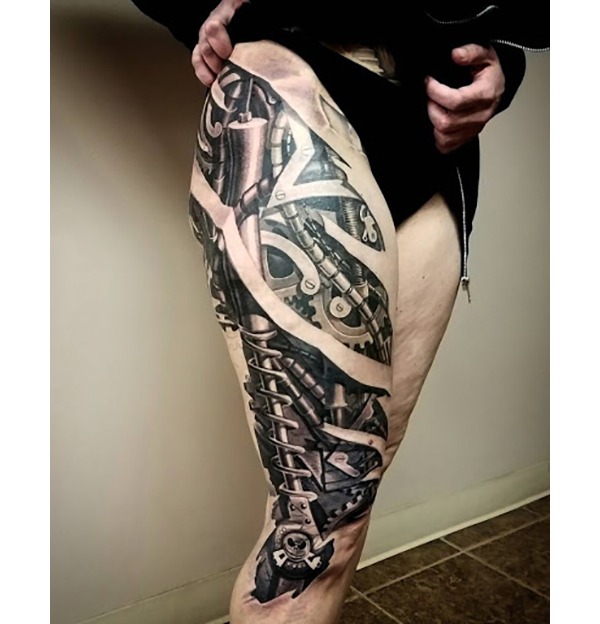 Black and White Biomechanical Woman’s Leg Tattoo Tattoo Design