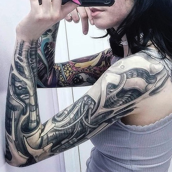 Female Biomechanical Arm Tattoo in Grayscale Tattoo Design