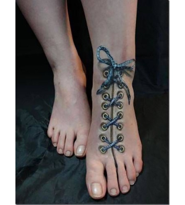 Realistic Shoelaces Biomechanical Tattoo on Foot Tattoo Design
