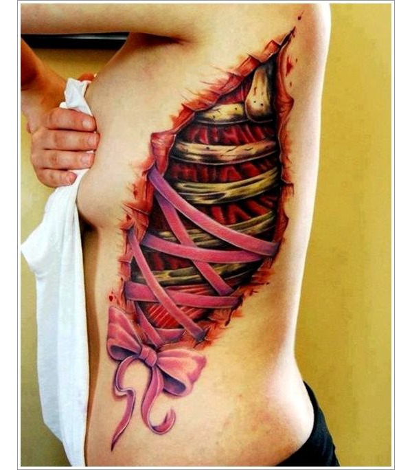 Rib Bones and Ribbon Woman’s Side Tattoo Tattoo Design