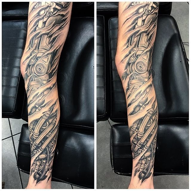 Ripped Skin with Robot Leg Biomechanical Tattoo Tattoo Design