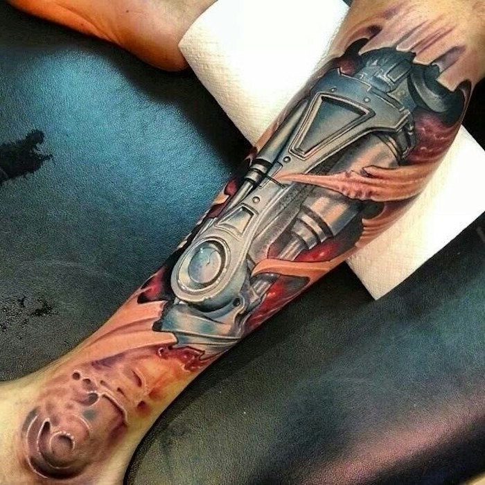 Shiny Metal Biomechanical Tattoo on Leg Tattoo Design