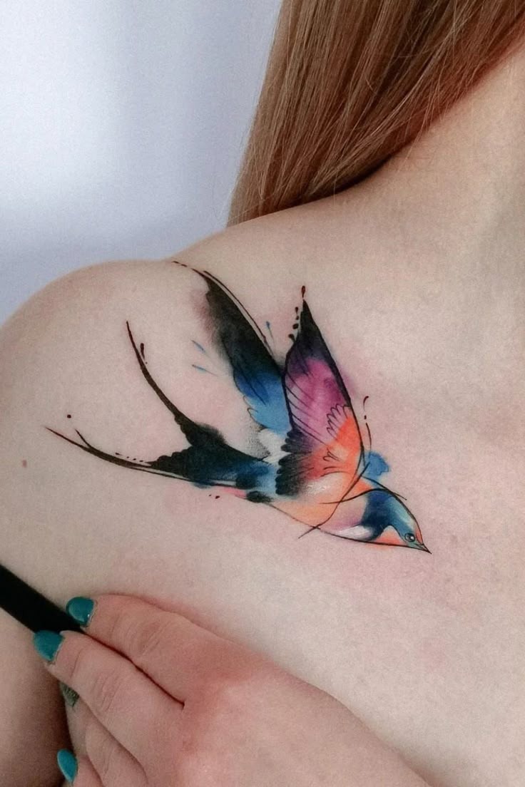 Colorful Swallow in Watercolor Style Tattoo Design