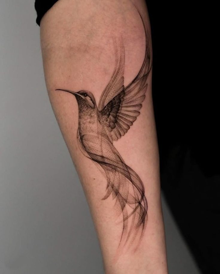 Ethereal Hummingbird with Flowing Tail Tattoo Design