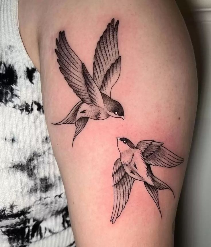 Flying Swallows in Motion Tattoo Design