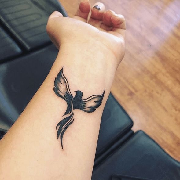 Rising Phoenix-Inspired Silhouette Tattoo Design
