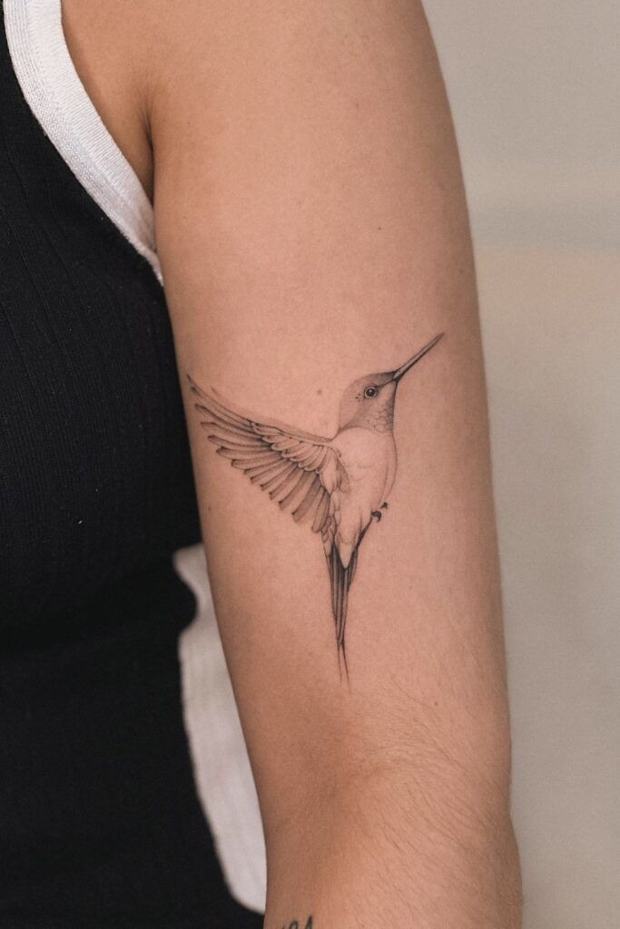 Simple Hummingbird in Flight Tattoo Design