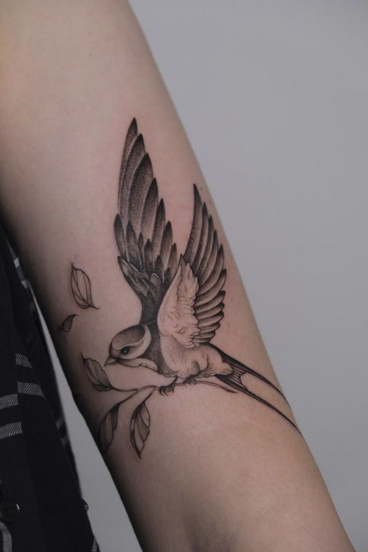 Swallow with Wind-Swept Leaves Tattoo Design