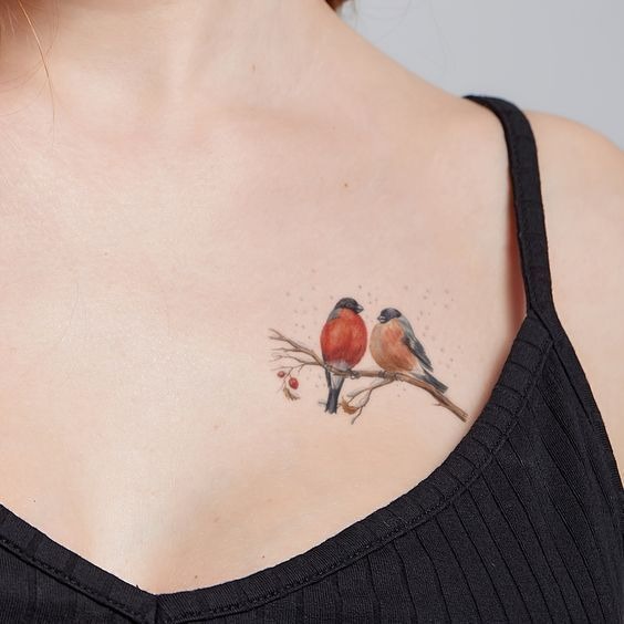 Two Birds on a Chest Branch Tattoo Design