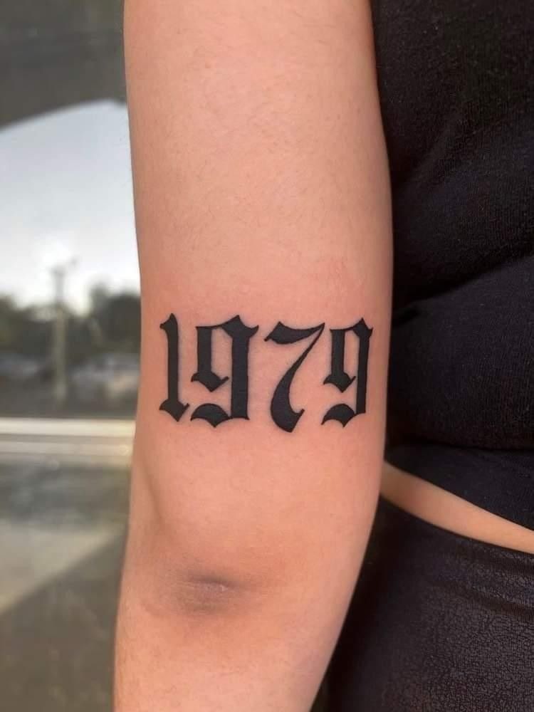 Bold 1970 Vintage Typography Tattoo Design
