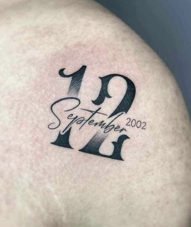 September 2002 Script Overlay Tattoo Design