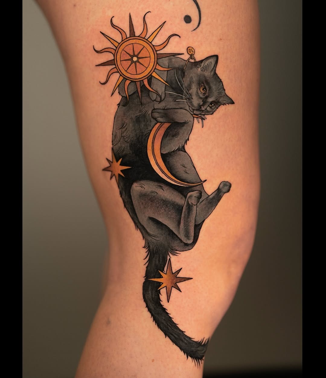 Elegant black cat tattoo with celestial elements Tattoo Design