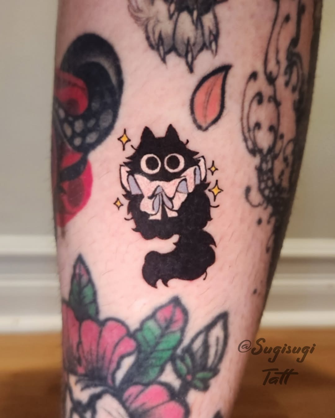 Funky black cat tattoo with playful vibes Tattoo Design