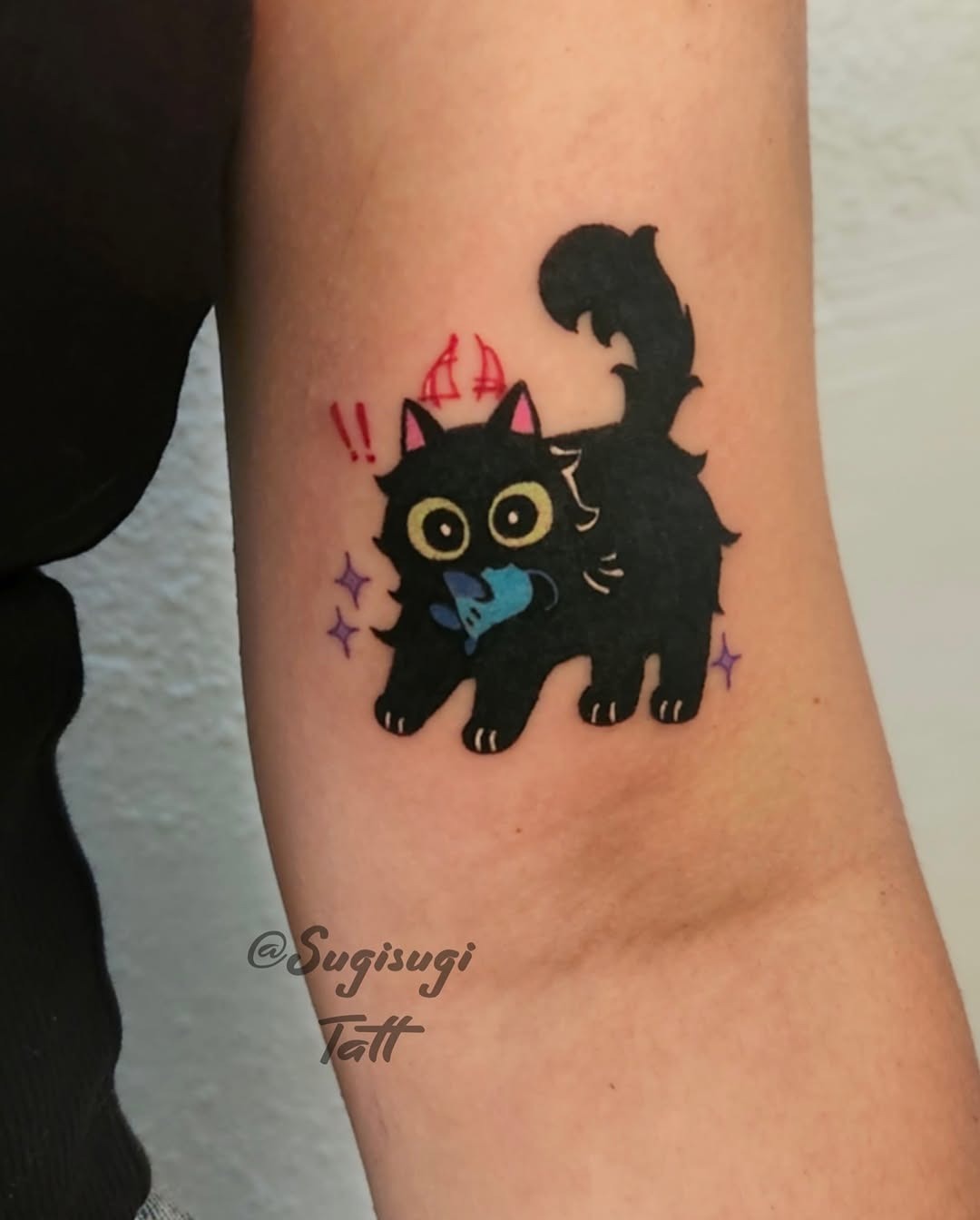 Playful black cat with colorful accents tattoo Tattoo Design