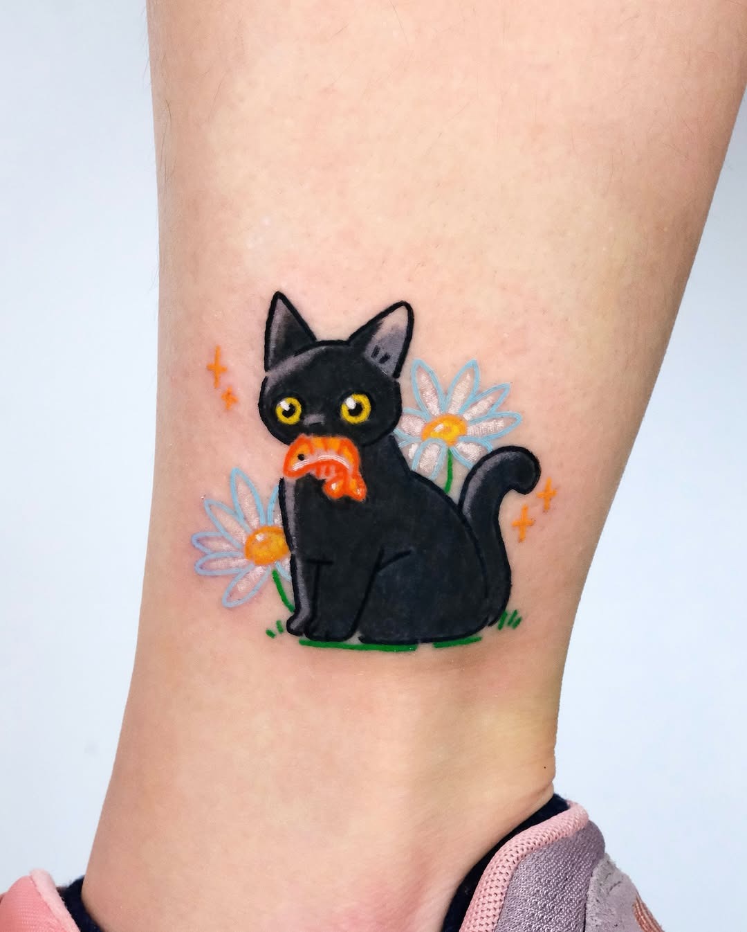 Playful black cat with food and flowers Tattoo Design