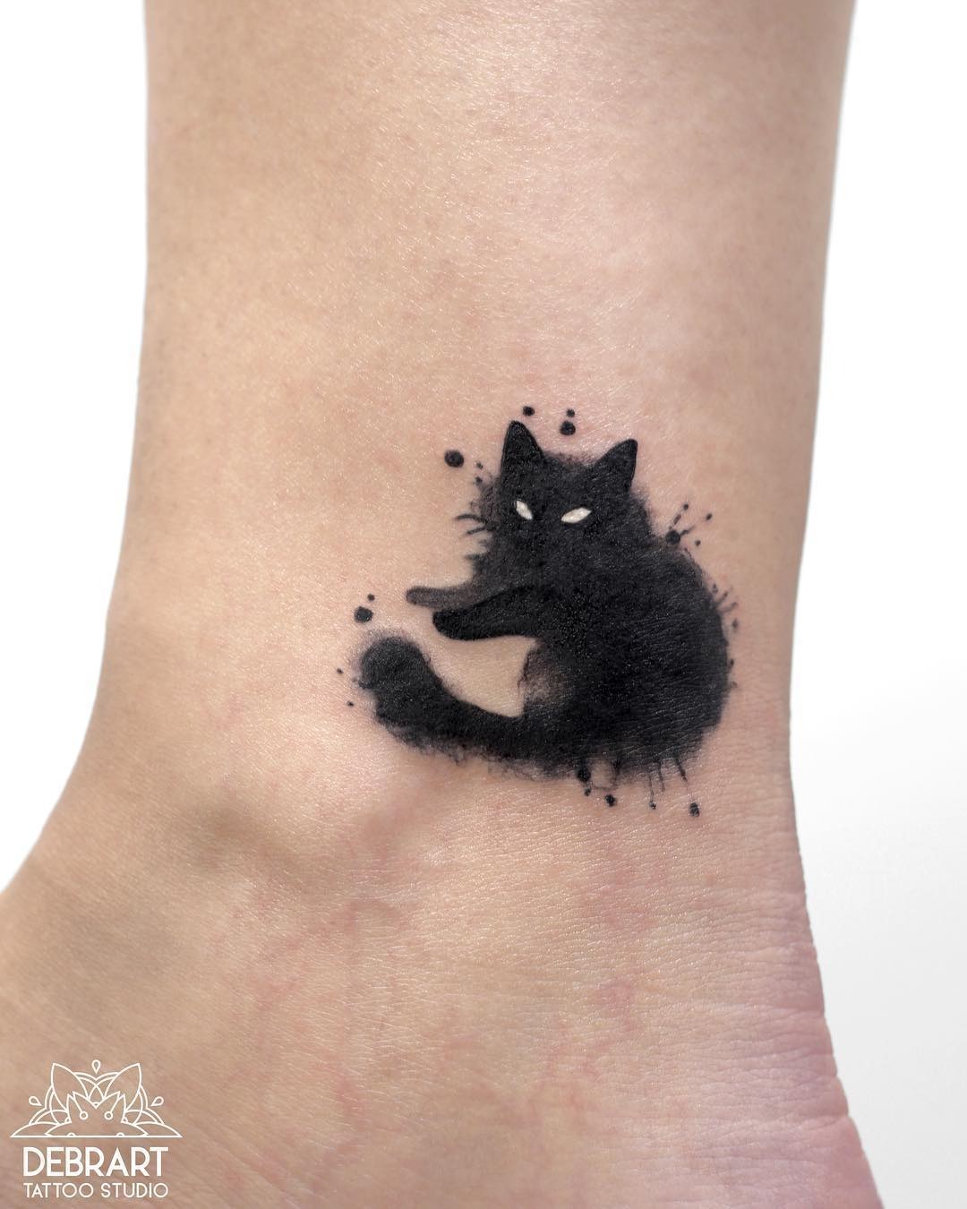 Striking minimalist black cat tattoo design Tattoo Design