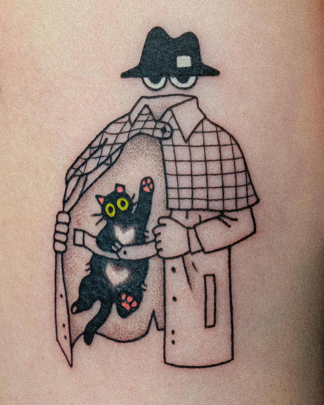 Whimsical black cat tattoo with surprising reveal Tattoo Design