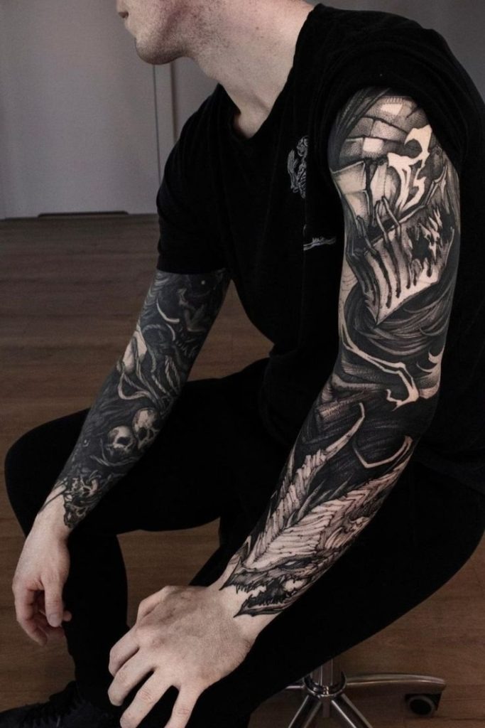 Experimental Blackout Forearm with Scratched Patterns Tattoo Design
