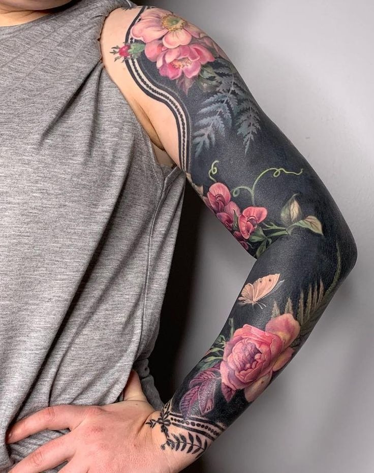 Floral Blackout Full-Sleeve Elegance Tattoo Design