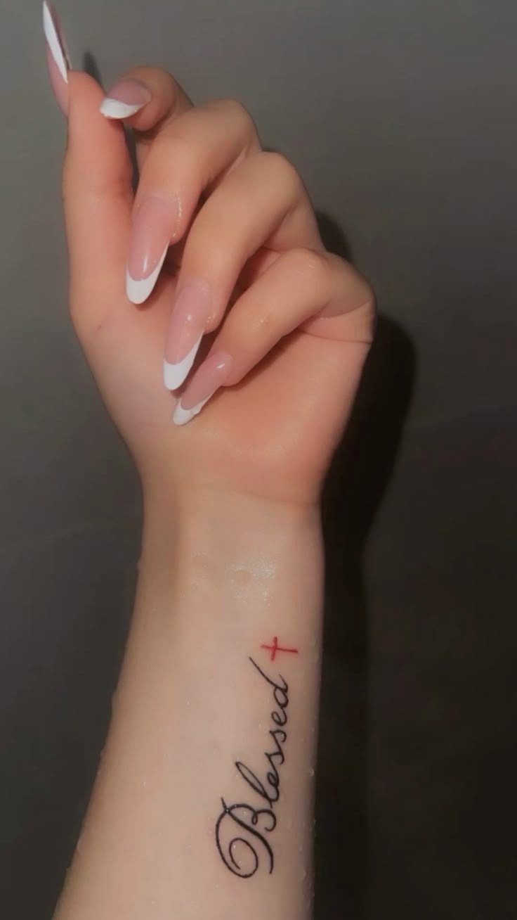Minimal Red Blessed Script Tattoo Design