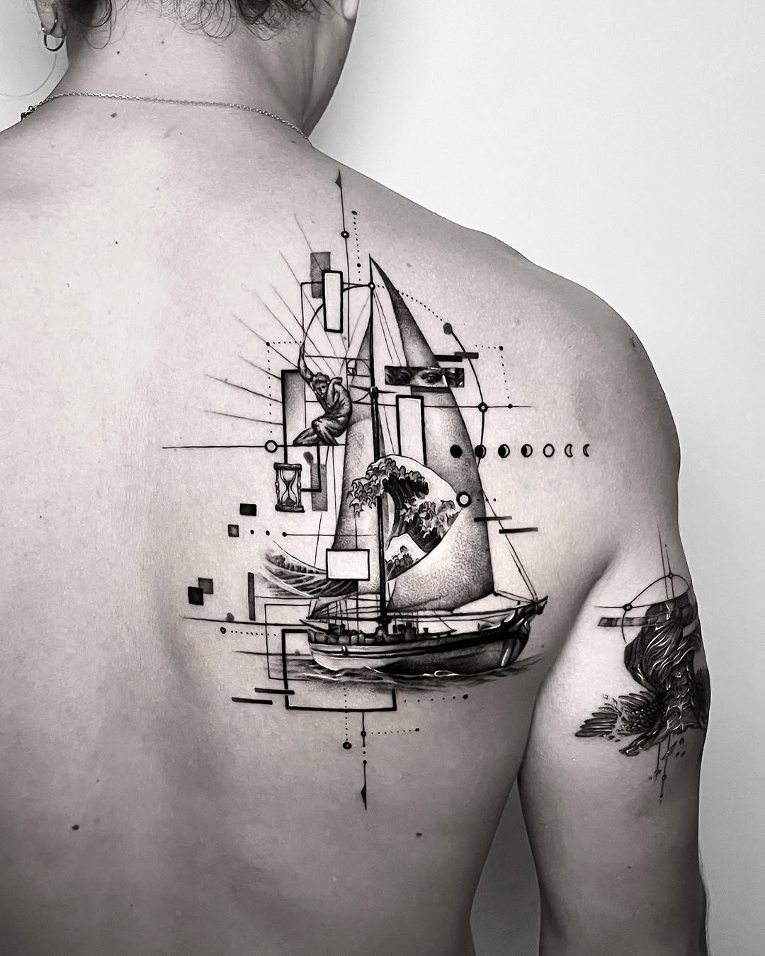 Artistic boat tattoo blending nature and geometry Tattoo Design