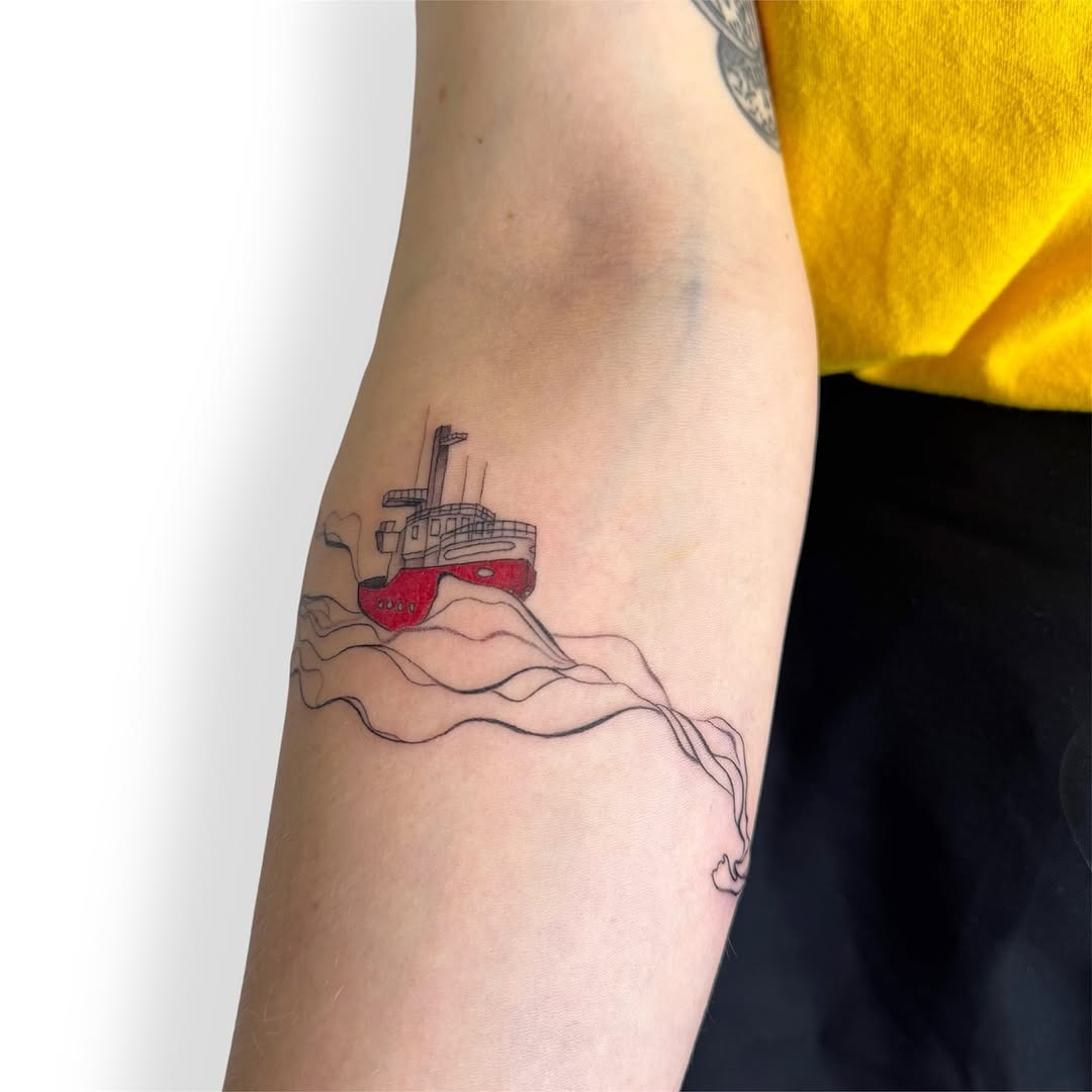 Colorful boat tattoo representing nautical adventure Tattoo Design