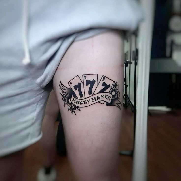 777 Money Maker Tattoo, a tattoo design rendered in bold for the hand.