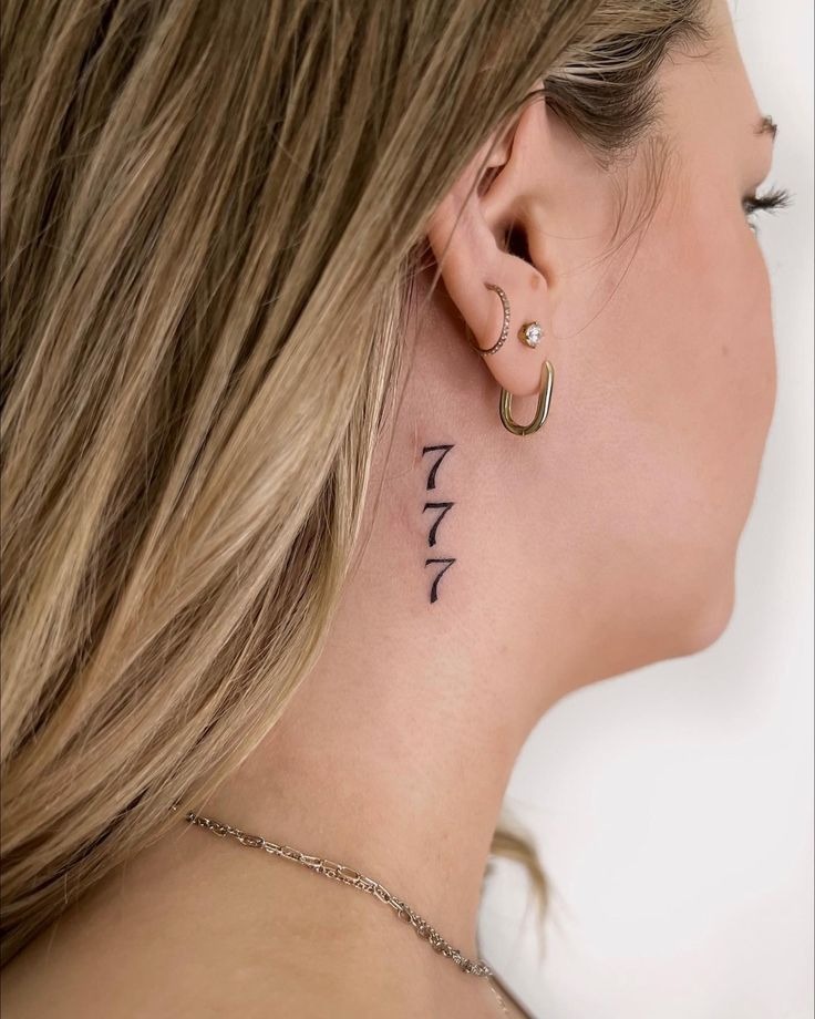 Behind-the-Ear Vertical 777, a tattoo design rendered in clean detailed linework.