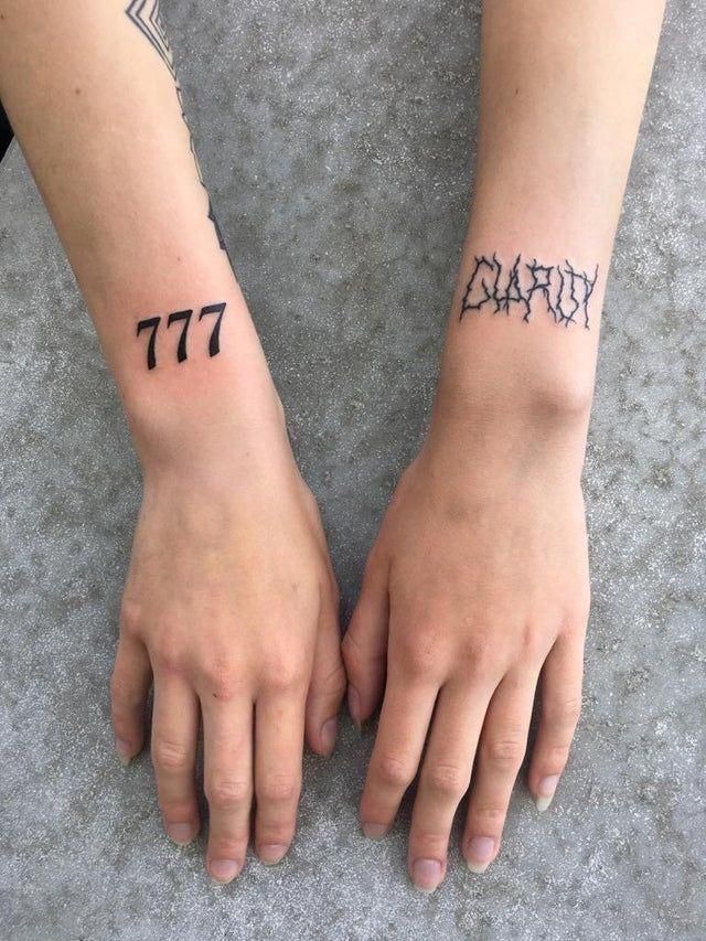 Bold Black 777 Wrist Ink, a tattoo design rendered in clean detailed linework.
