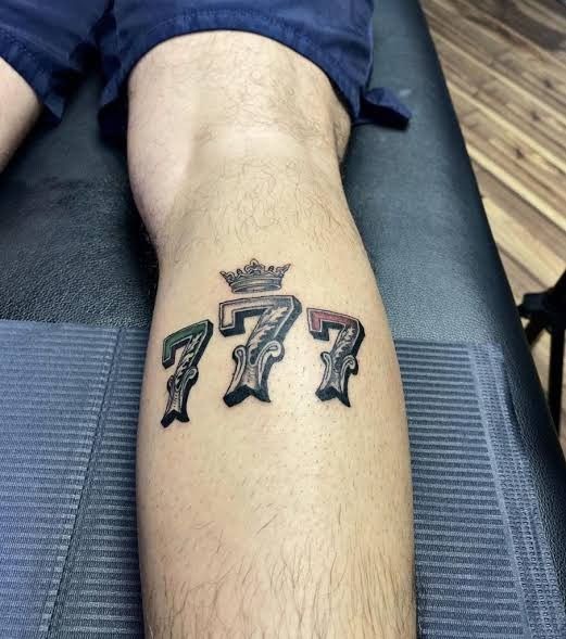 Crowned Color 777 Calf Tattoo, a tattoo design rendered in clean detailed linework.