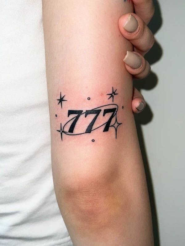 Sparkling Galaxy 777 Tattoo, a tattoo design rendered in clean detailed linework.