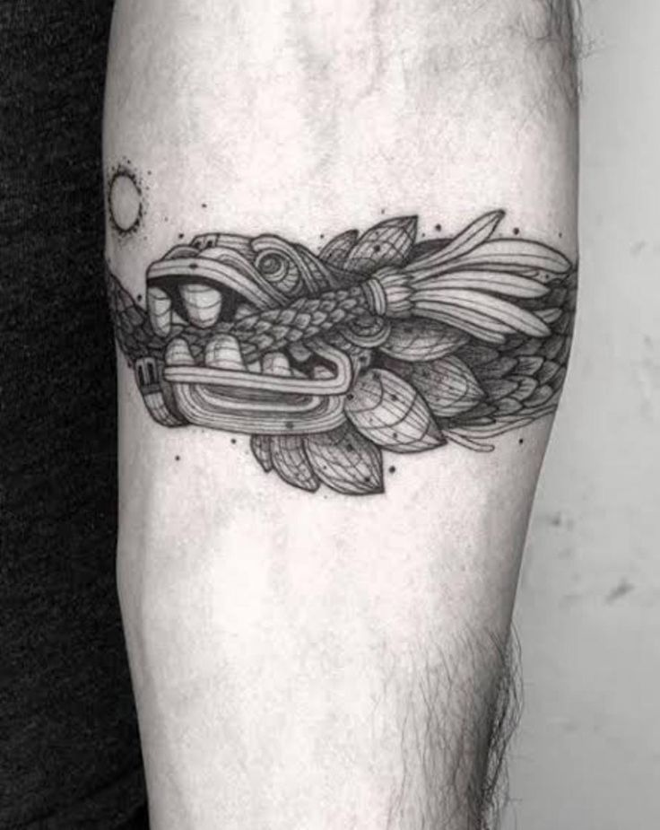 Feathered Serpent with Celestial Accent Tattoo Design