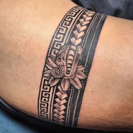 Serpent Band with Traditional Motifs Tattoo Design