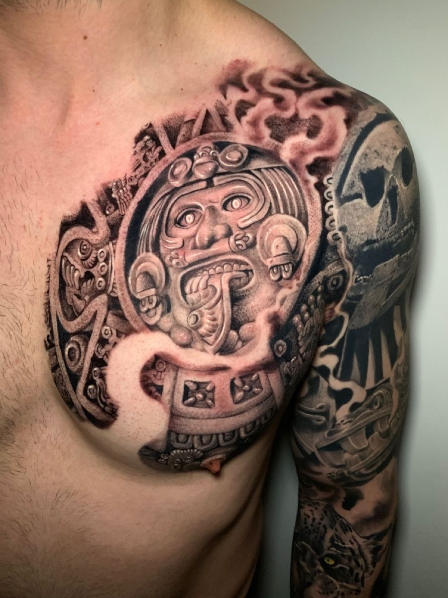 Chest Sunstone Relic Tattoo Design