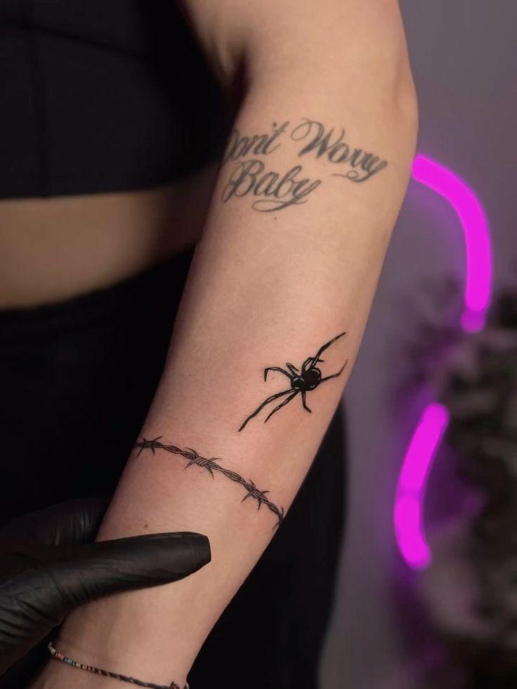 Black Widow and Barbed Arm Wrap Tattoo Design