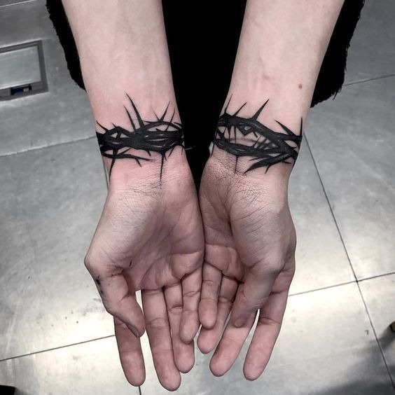 Bold Black Barbed Wrist Cuffs Tattoo Design
