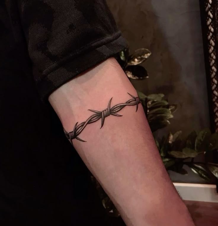 Minimalist Barbed Wire Forearm Wrap Tattoo Design