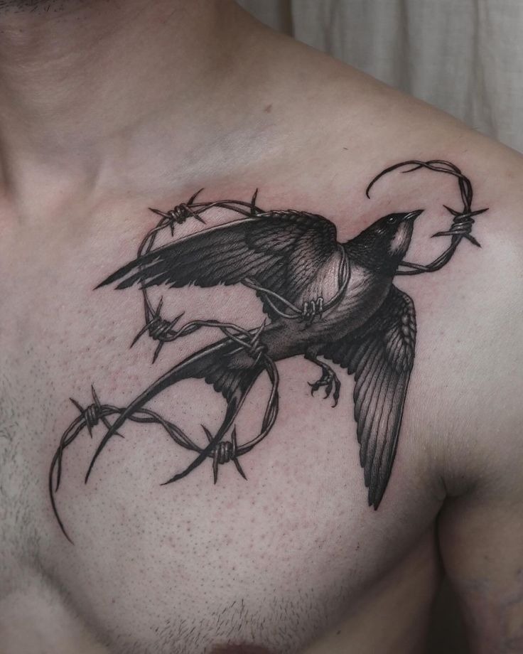 Trapped Flight Barbed Chest Tattoo Tattoo Design