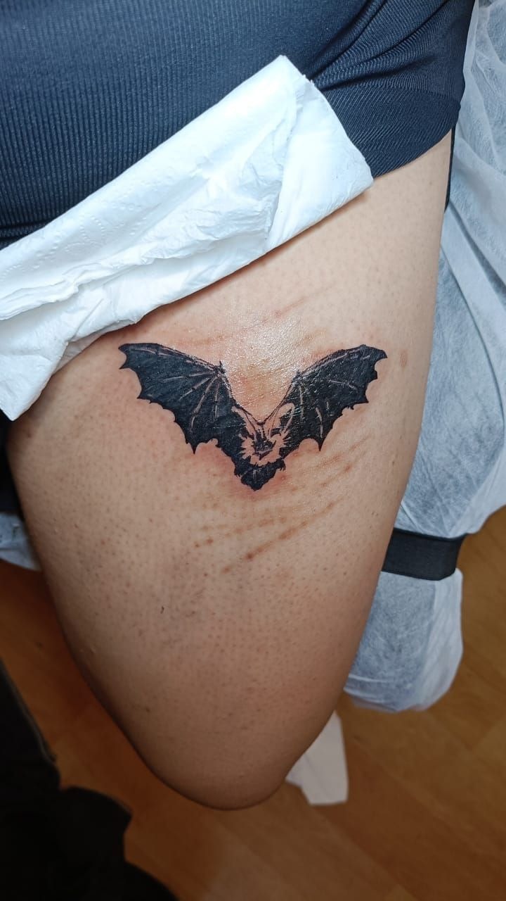 Bold Little Bat with Clean Dark Shape Tattoo Design
